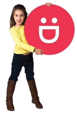 Child holding Safe Kids logo sign