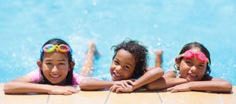 Kids at the edge of a pool